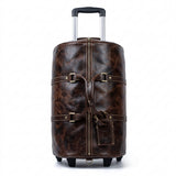 Brown leather rolling duffel bag on a white background